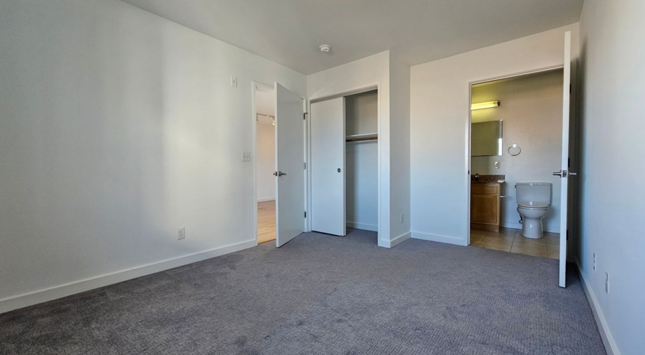 Mission: Bright 4 Bed 2 Bath Condo w/ Private Deck, Garage Parking, and Shared Rooftop Deck 