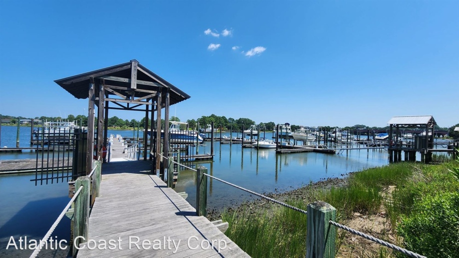 3 Bedroom/2.5 Bath two-story condo, a true gem within a waterfront paradise!
