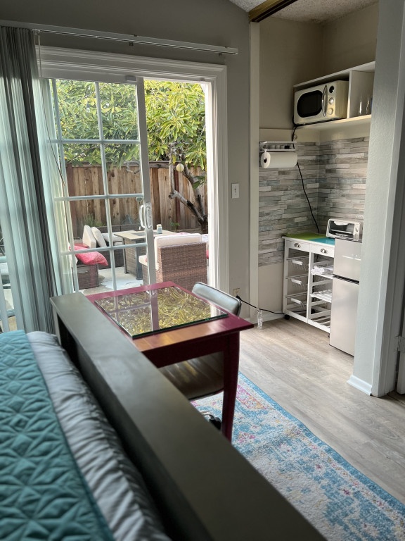 Nicely furnished suite with private entrance and kitchenette available.  (949)408-8051