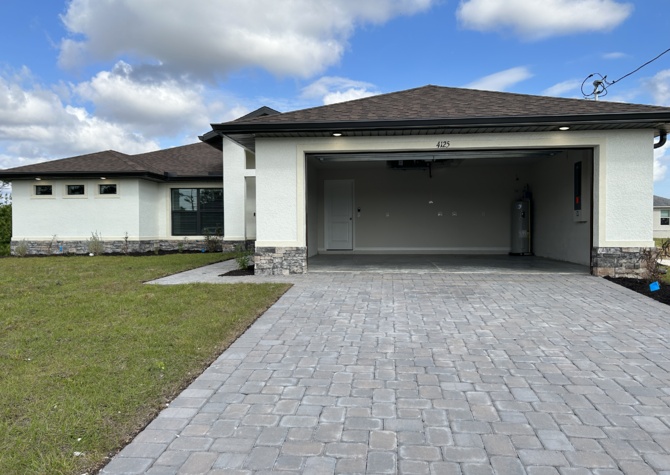 Houses Near 4125 NE 21st PL - Charming New Construction Home in Cape Coral