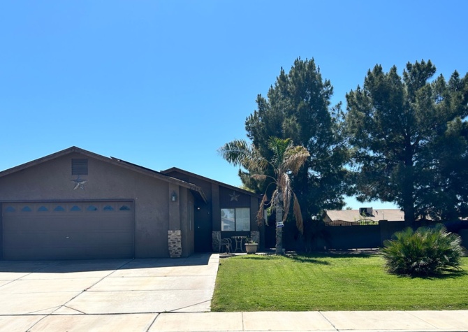 Houses Near  Charming 3-Bedroom Home with Wood Flooring and Large Yard in Yuma