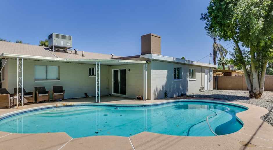 WOW! 4 BEDROOM, 3 BATH HOME W/ 2 MASTER SUITES & SPARKLING POOL. COMPLETELY REMODELED