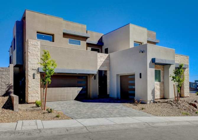 Houses Near Welcome to your dream home nestled within the prestigious gated community of Tresor at Black Mountain in Henderson.